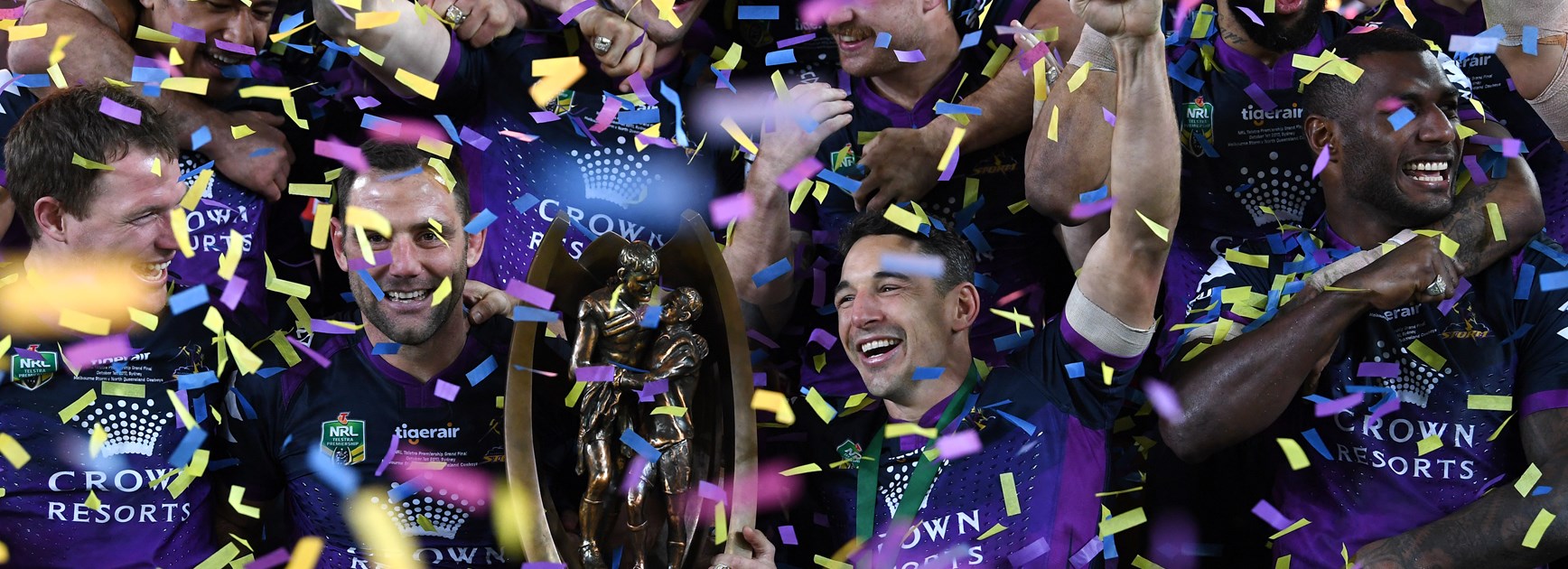 Melbourne Storm duo Cameron Smith and Billy Slater holding the premiership trophy.