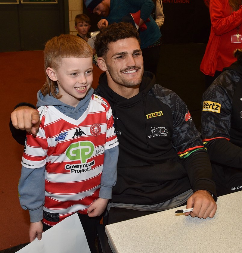 Nathan Cleary with a young Wigan fan ahead of the WCC