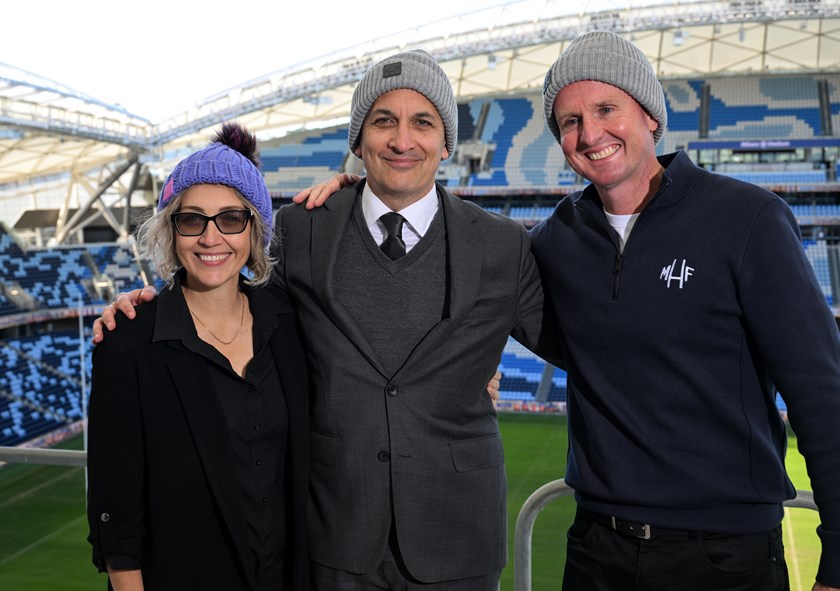 Mark and Kirralee Hughes with NRL CEO Andrew Abdo at the Beanie Round launch at Allianz Stadium.